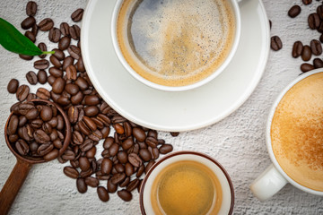 Coffee and coffee beans on white background