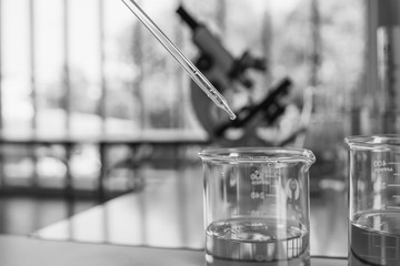 Laboratory Tube With sampling of Virus corona covid 19 vaccine. 
Scientific Lab equipment Close-Up. Concept of Pandemic Disease and Healthcare Vaccine.