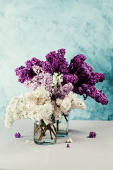 Bouquet of lilac flowers in three colors