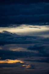 Impressive dramatic blue and orange cloudy sunset sky