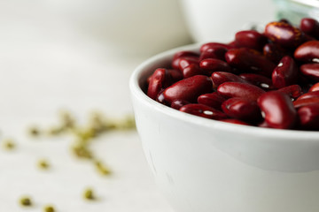 Raw cereals or beans in glass jars close up. Vegan and vegetarian food. Close up.