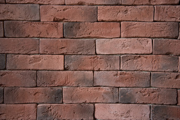Background of a red brick wall. Old bricks close-up. Texture.