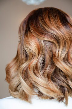 Wavy hair dyed red