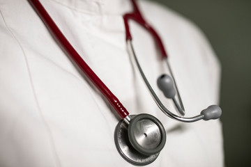 Close up shot of a doctor with a stethoscope.