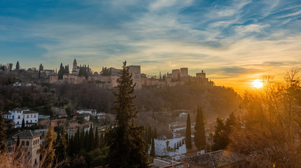 Fototapeta na wymiar Sunset in Granada. The fortress and arabic palace complex of Alhambra, Spain