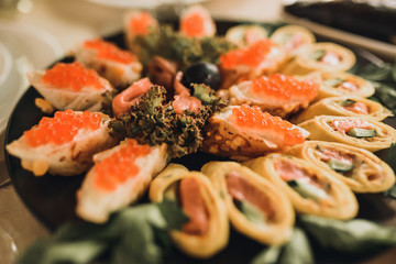 Catering services in restaurant outdoor on wedding ceremony. Food and glass of champagne. restaurant