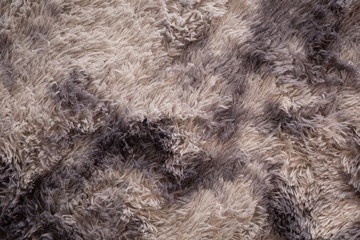 abstract fluffy fur towel on floor .