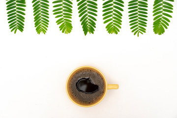 cup of coffee on white background ,top view