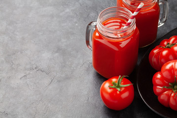 Fresh tomato juice and ripe tomatoes