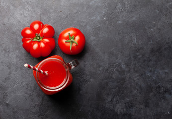 Fresh tomato juice and ripe tomatoes