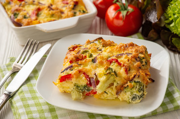 Colorful vegetable casserole with cheese, vegetarian dish.