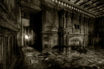 Old room with wooden walls and a fireplace in an abandoned building in Russia