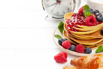 Delicious homemade pancakes with summer berries