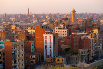 Cairo skyline at sunset stacked houses buildings Egypt 