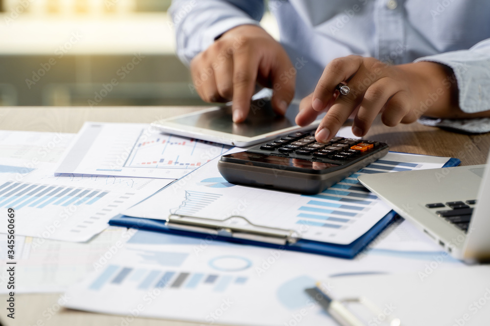 Poster financial report- business accounting money stack concept business man using calculator graph discus