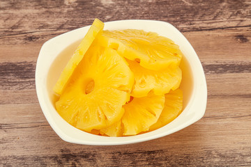 Marinated pineapple rings in the bowl