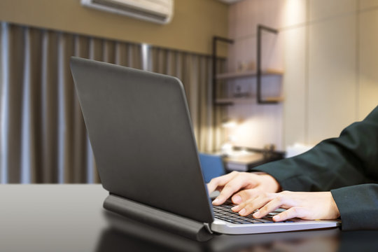 Business people using a laptop working from home