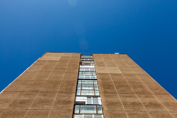  Facade of a modern apartment building. Modern apartment buildings on a sunny day with a blue sky.