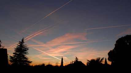 aircraft wake at sunset