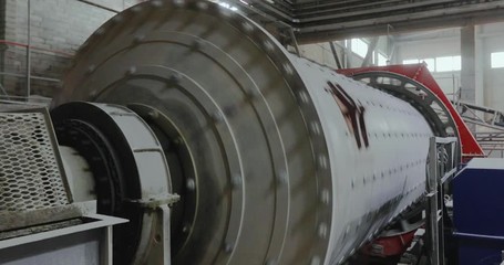 Industrial mill, ball mill, mill at the factory, grinding with metal balls