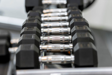 Close up view of dumbbells on the rack