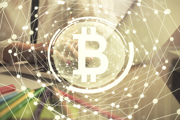 Double exposure of woman hands typing on computer and crypto market theme hologram drawing. Blockchain concept.