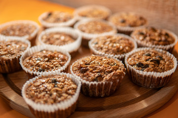 Healthy homemade fruit-cakes with raisins and cinnamon