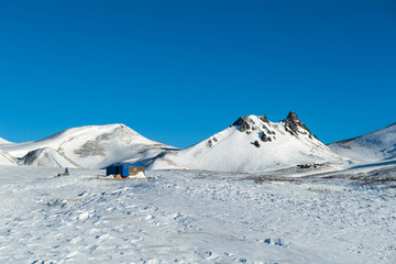 Winter Volcanos in Kamchatka with fuming tops
