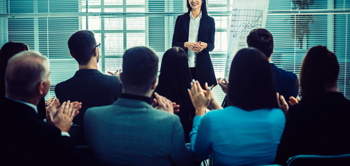 businesswoman making a presentation for the employees of the company