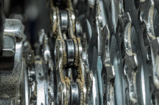 Dirty rust covered bicycle chain on a bicycle