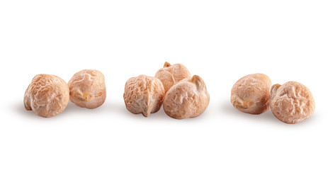 Several whole dry chickpeas in a row