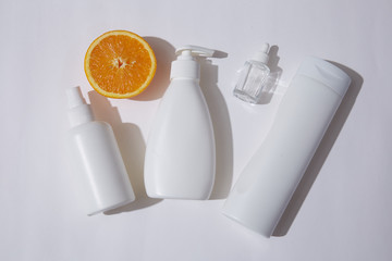 White bottle flacon cosmetics beauty product for skin care face cream and body lotion, shower gel natural organic cosmetology.