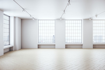 Minimalistic loft interior with window to city