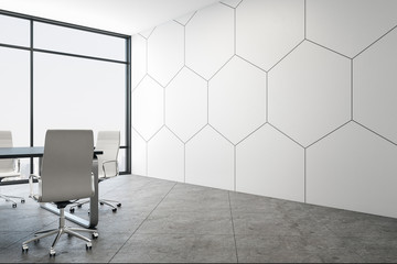 Modern conference interior with abstract blank honeycomb wall.