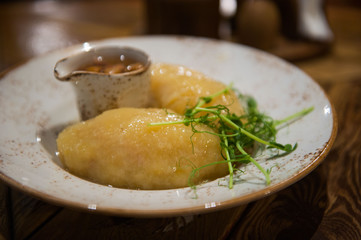 Typical lithuanian dish made from potatoes and meat - cepelinai. 
