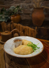 Typical lithuanian dish made from potatoes and meat - cepelinai. 
