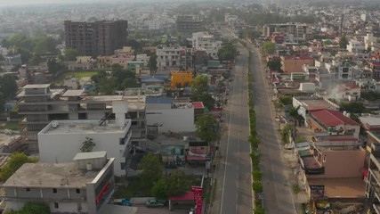 Dehradun, Uttarakhand/India- May 2 2020: World disaster . Coronavirus 3 Lockdown in India. Aerial views of empty roads , shops closed in india uttarakahnd dehradun   .  Aerials 4k