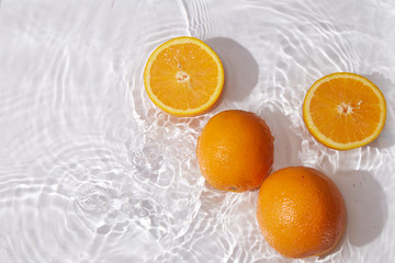 Fresh juicy fruit citrus orange on white background water drops natural organic delicious nutritious healthy food vegetarian freshness diet vegan.