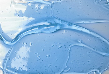 Blue fresh pure water wave splash texture background isolated on white, top view