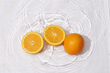Fresh juicy fruit citrus orange on white background water drops natural organic delicious nutritious healthy food vegetarian freshness diet vegan.