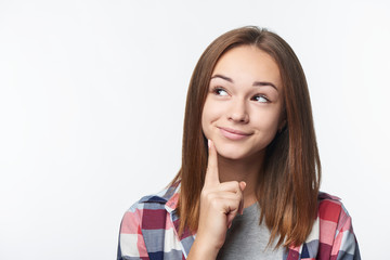 Closeup portrait of thinking teen girl looking to side