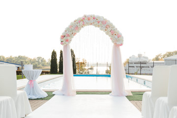 Fototapeta na wymiar wedding decor, arch, and floristry, visiting ceremonies, details, rings