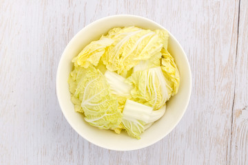 Chinese cabbage cropped on wooden background