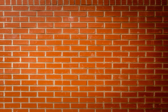 Red brick wall texture of regular shape