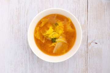 Chinese cabbage soup on wooden background