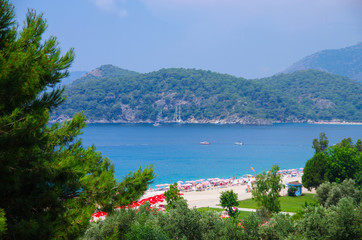 Fototapeta na wymiar Oludeniz, Turkey - June, 2019: View of the beach in summer day