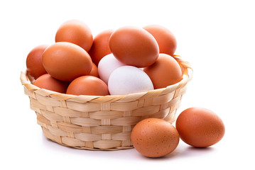 Eggs in a wicker basket. Isolate on white background
