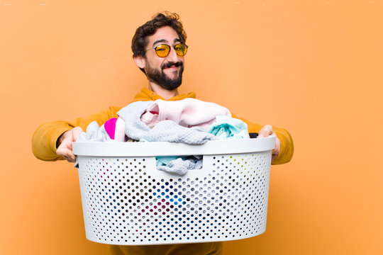 Young Crazy Cool Man With The Laundry Basket