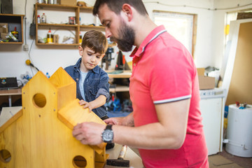 Father and Son Making a Birdhouse