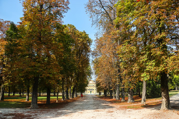 Parma, Italy. Beautiful architecture of Ducal Palace (Palazzo Ducale di Parma) in community garden...
